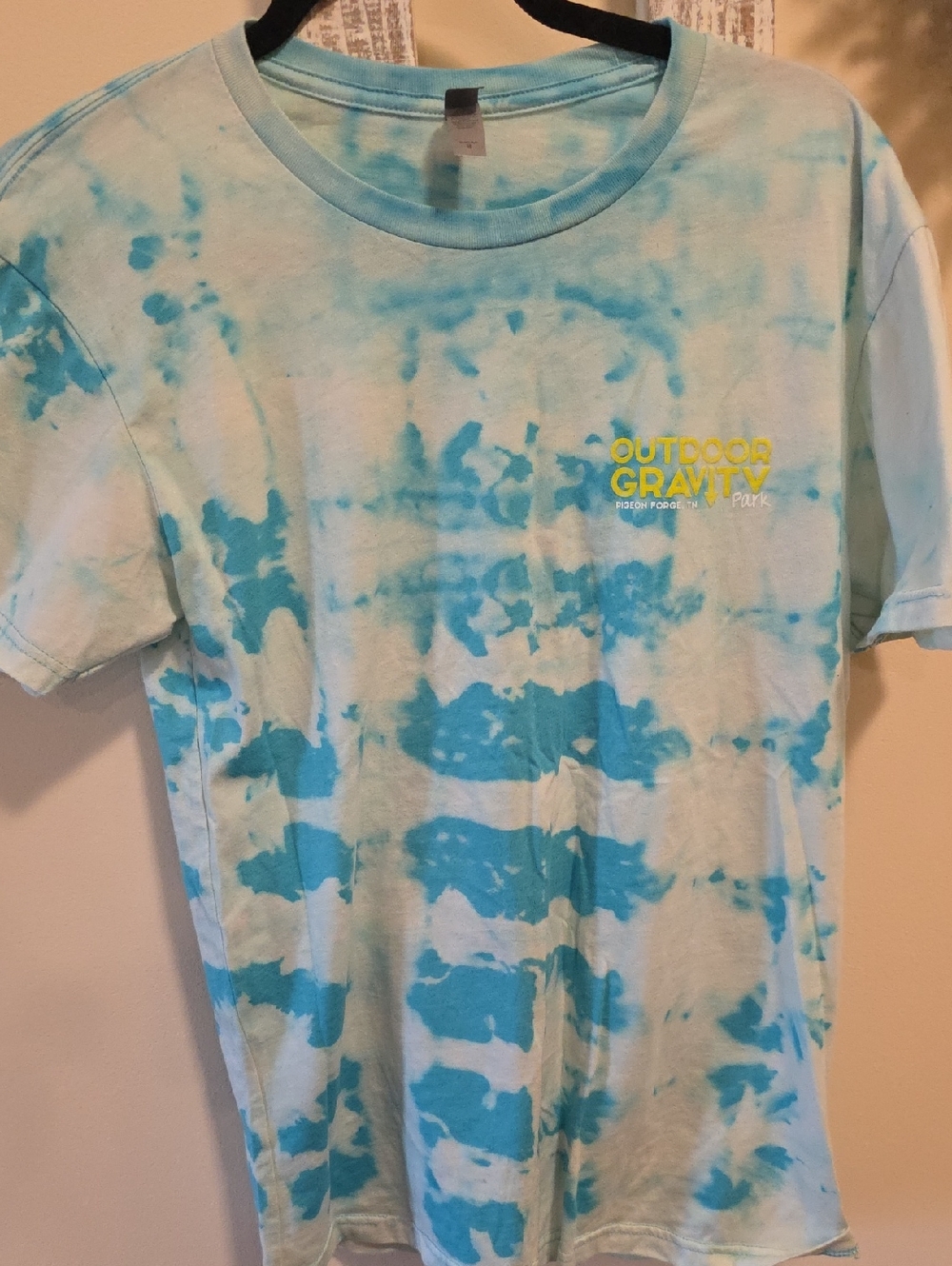Next LEVEL Blue Tie-Dye Short Sleeve Tee with Yellow Logo